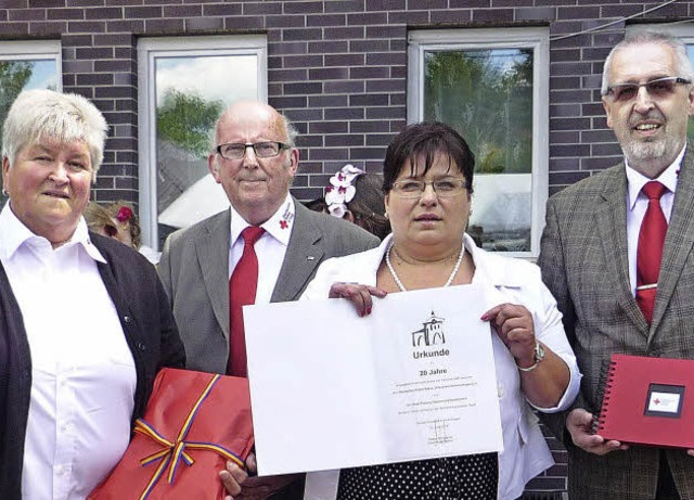 20 Jahre Partnerschaft mit dem Haus de...red Sperling (rechtes Foto von links).  | Foto: Rotes Kreuz