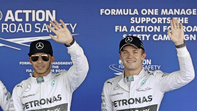 Lewis Hamilton (links) hat im Augenbli... auch Nico Rosberg darf noch trumen.   | Foto: DPA