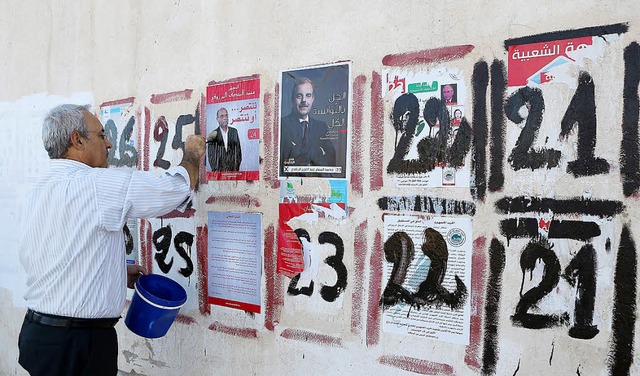 Jedem Bewerber ein festes Pltzchen &#8211; Wahlkampf in Tunis  | Foto: dpa