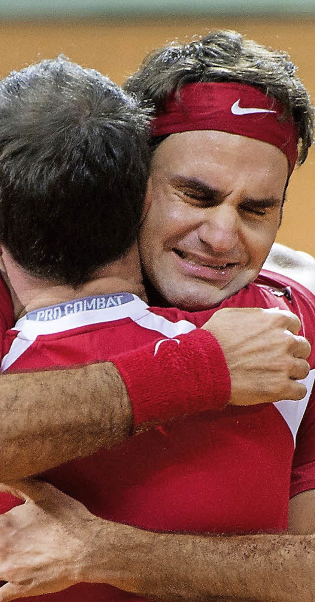 Spiel, Satz, Sieg und Trnen: Roger Fe...er Daviscup-Teamchefs Severin Lthi.    | Foto: AFP