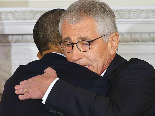 Umarmung zum Abschied: Obama, Hagel   | Foto: AFP
