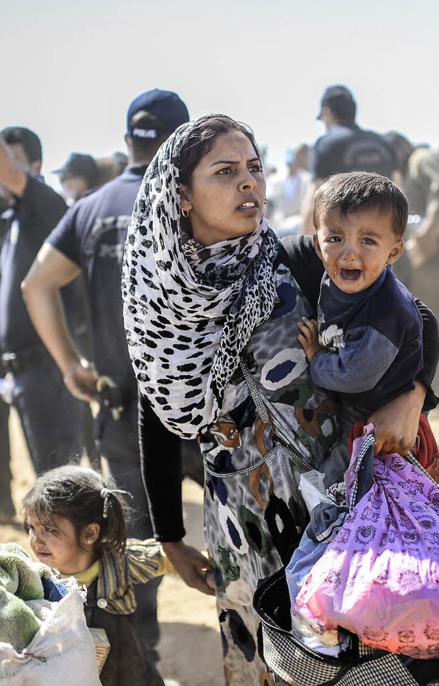 Flchtlinge an der syrisch-trkischen Grenze  | Foto: AFP