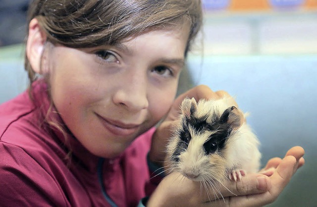 Eine junge Zchterin mit ihrem Tier  bei der Schau in Altdorf   | Foto: Sandra Decoux-Kone