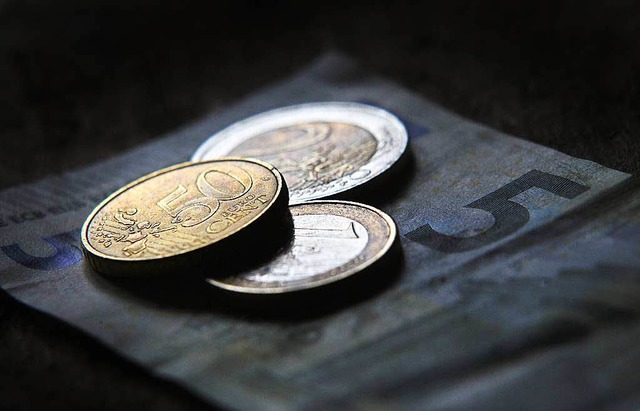 Acht Euro und fnzig Cent, das ist knftig der Mindestlohn in Deutschland.  | Foto: dpa
