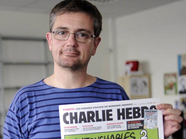 Charb mit dem Satireblatt   | Foto: dapd