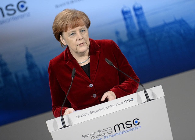 &#8222;ber das ,Es sei denn&#8217; sp...erin Angela Merkel am Pult in Mnchen   | Foto: dpa