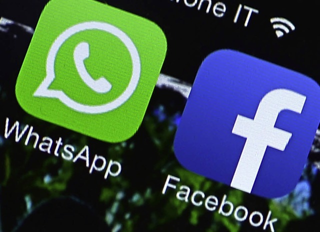 Eintrchtig zur Weltherrschaft bei den Messengern: WhatsApp und Facebook  | Foto: AFP