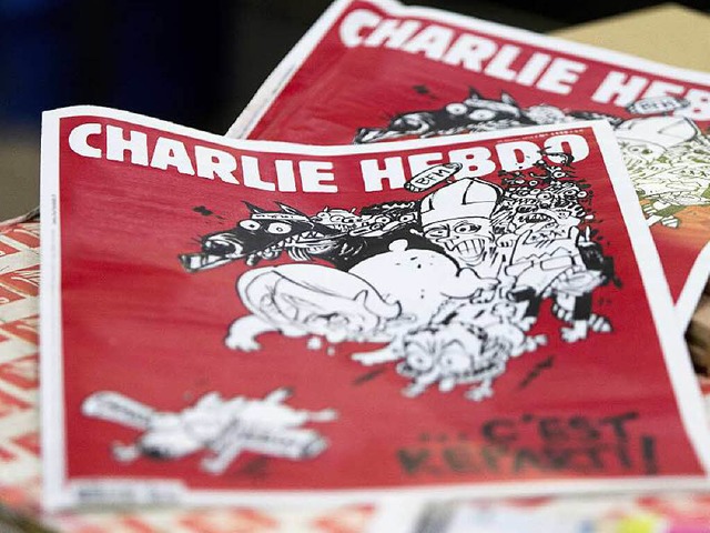 Frontalangriff auf den Front National:...t der neuen Ausgabe von Charlie Hebdo   | Foto: afp