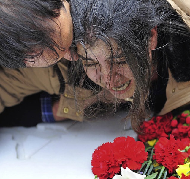 Die Mutter am Grab  | Foto: AFP