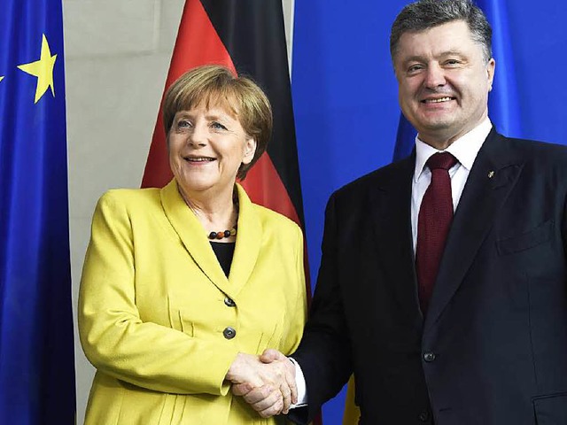 Angela Merkel und Petro Poroschenko  | Foto: AFP