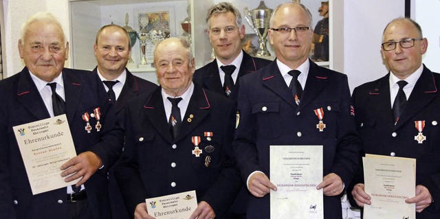 Kommandant Markus Bechtold und Wolfram...as Kbler und Pius Bechtold (40 Jahre)  | Foto: Frowalt Janzer