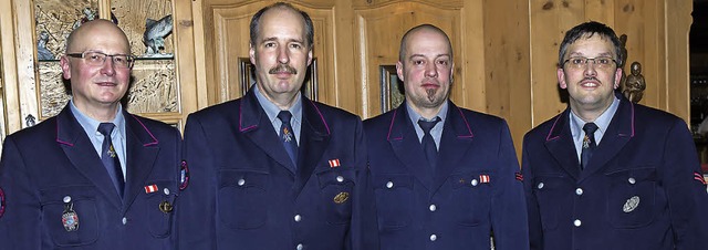 Gesamtwehrkommandant Guido Strittmatte... Rolf Schlatter und Christian Gantert.  | Foto: Chris Seifried