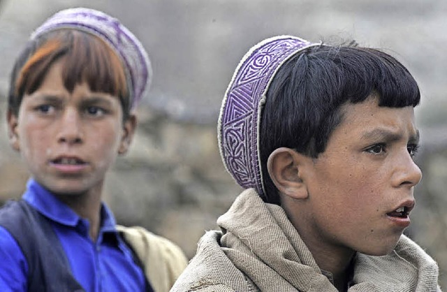 Mdchen, Junge? In Afghanistan passier...ss in Jungenkleidern Mdchen stecken.   | Foto: AFP