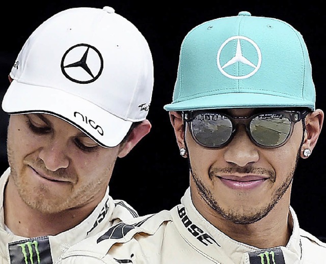 Enttuscht: das Mercedes-Duo Rosberg (links) und Hamilton  | Foto: AFP