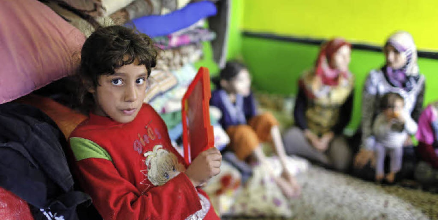 Früher lebte dieses Kind im syrischen ...unterkunft in Gaziantep in der Türkei.  | Foto: dpa
