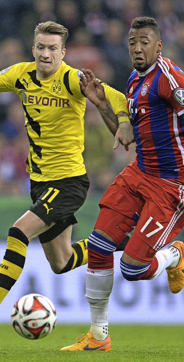 Sprintduell: Marco Reus (links) gegen Jerome Boateng  | Foto: dpa