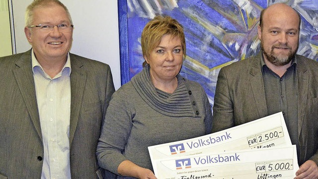 7500 Euro hat allein die Lffinger Fir...Sabine Willmann und Norbert Halbherr.   | Foto: Martin Wunderle