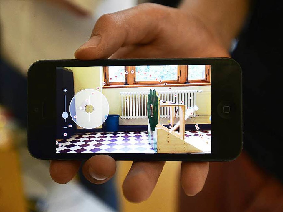 Das Experiment Schokokussschleuder, prsentiert auf dem Smartphone  | Foto: Ingo Schneider