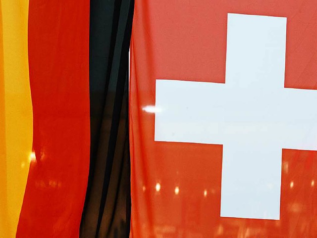 Pltzlich will die Schweiz dabei helfe...twa in Deutschland) Steuern zu umgehen  | Foto: dpa