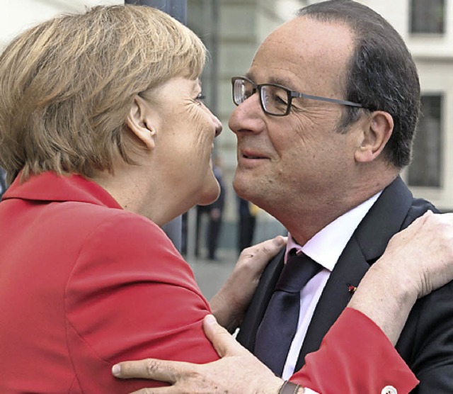 Verstehen sich: Angela Merkel und Franois Hollande  | Foto: dpa