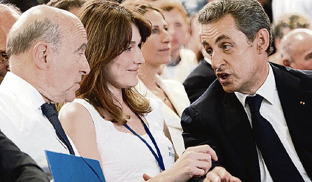 Alain Jupp, Carla Bruni und Nicolas Sarkozy (von links)  | Foto: AFP
