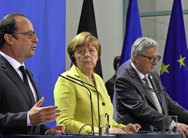 Franois Hollande, Angela Merkel und Jean-Claude  Juncker (von links)   | Foto: AFP