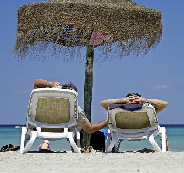 Entspannt den Urlaub genieen &#8211; ...ndsreisekrankenversicherung beruhigt.   | Foto: DPA