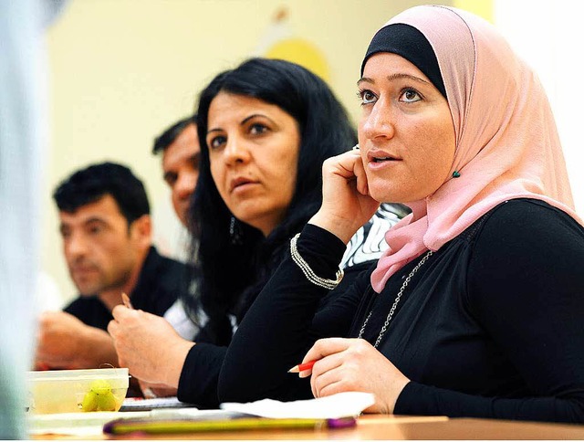 Muslima beim Deutschunterricht  | Foto: dpa