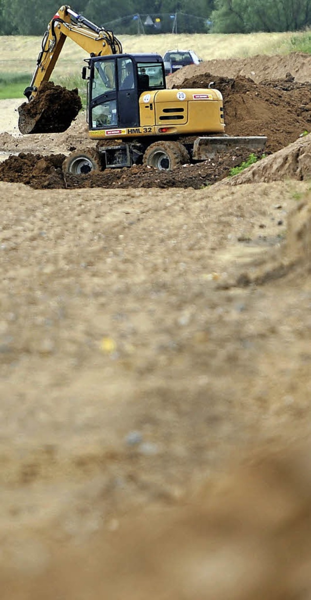 Bagger bei der Arbeit  | Foto: Marius Becker