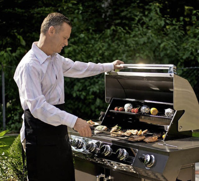 Glcklich, wer solch einen Grill sein ...stag, 11. Juli, am Weber-Grill messen.  | Foto: dpa-tmn