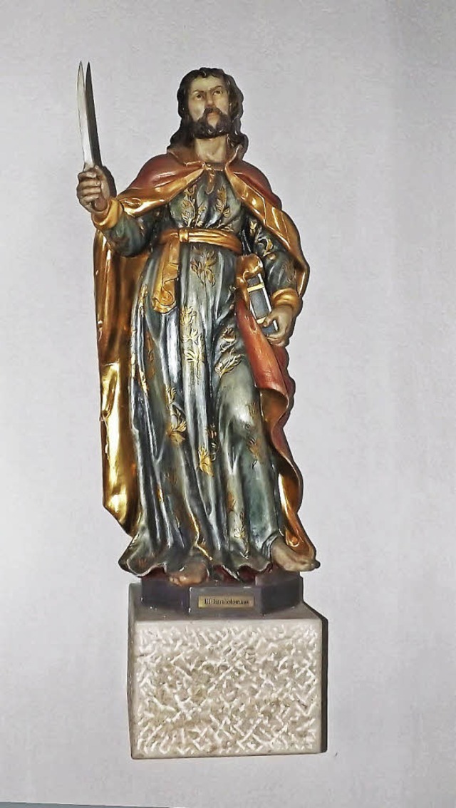 Eine Figur von St. Bartholomus in der Grwihler Kirche   | Foto: Adam