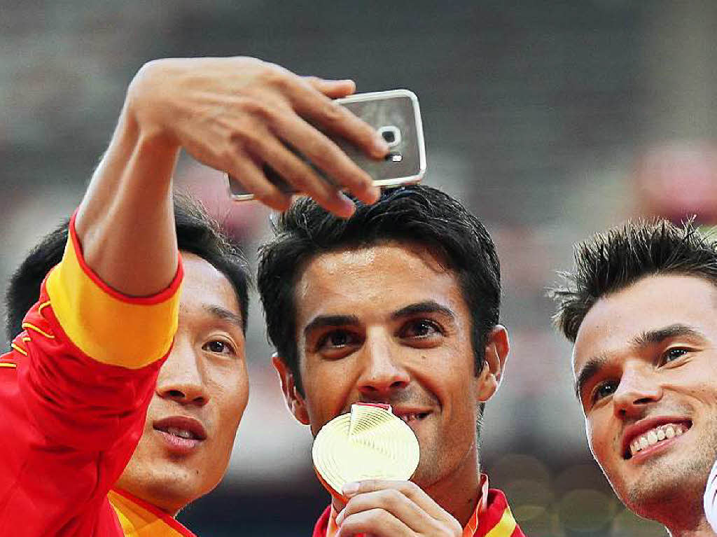 Erstmal ein Selfie auf dem Siegertreppchen: Wang Zhen (China), Miguel ngel Lpez (Spanien),Benjamin Thorne (Kanada).