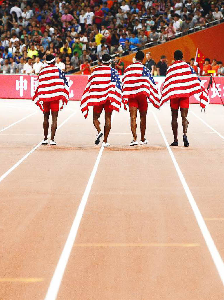 Die Sprinter ber 4x100 Meter aus den USA.