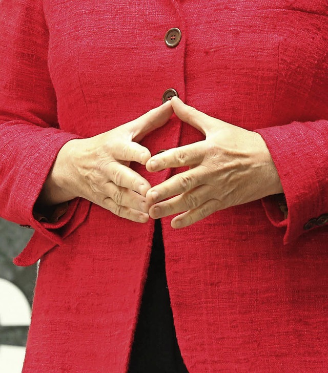 Die ruhige Hand: Merkel  | Foto: AFP