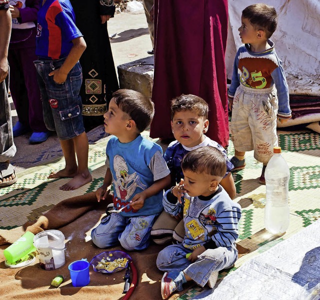 Syrische Kinder in einem Flchtlingslager   | Foto: afp