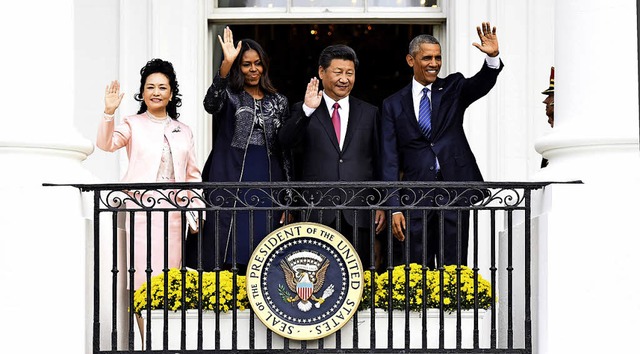 Im Kreis der Mchtigen: Xi Jinping (Zw...Besuch bei Michelle und Barack Obama.   | Foto: AFP