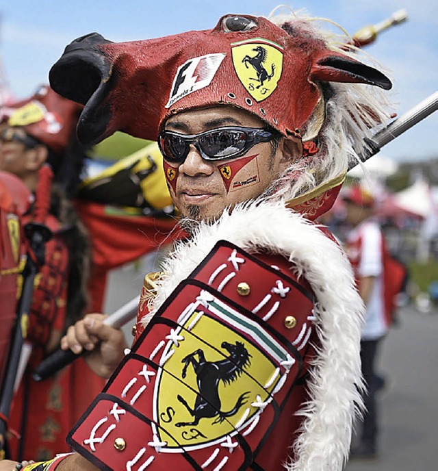 So sieht Ferrari-Fan-Freude auf japanisch aus.   | Foto: dpa, AFP