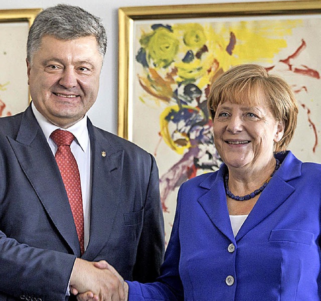 Prsident Petro Poroschenko mit Bundeskanzlerin Angela  Merkel in New York   | Foto: DPA