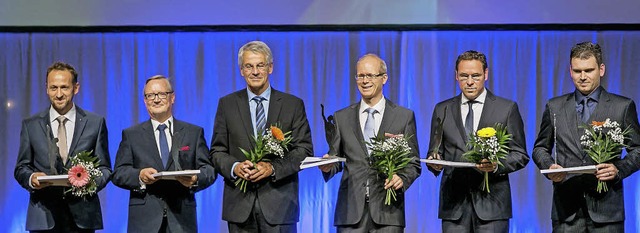 Firmenchef Joachim Huber (links) bei der Preisverleihung in Wrzburg  | Foto: stiftung