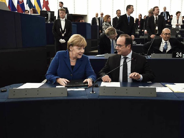 Angela Merkel und Franois Hollande im Europaparlament in Straburg  | Foto: afp