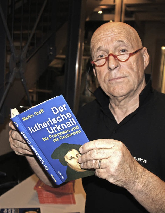 Der Autor Martin Graff in Herbolzheim:...22;Der lutherische Urknall&#8220; vor.  | Foto: Ilona Hge