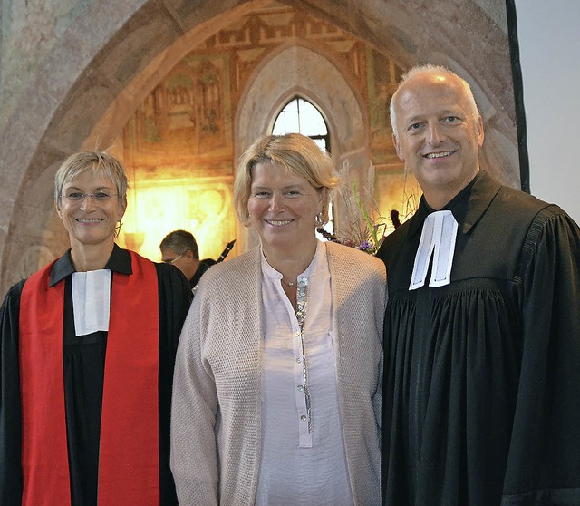 Martin Braukmann und seine Frau Sabine...che offiziell in sein Amt eingefhrt.   | Foto: Langelott