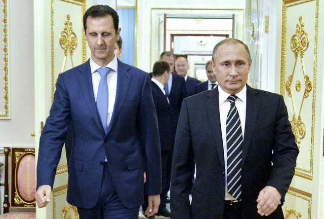 Prsidenten mit Kriegserfahrung:  Assad und Putin trafen sich in Moskau.    | Foto: dpa