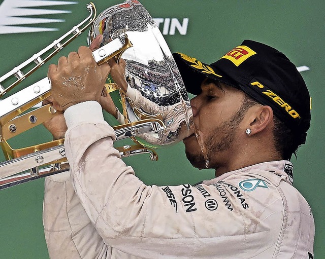 Lewis Hamilton ist wieder Formel-1-Weltmeister.   | Foto: afp