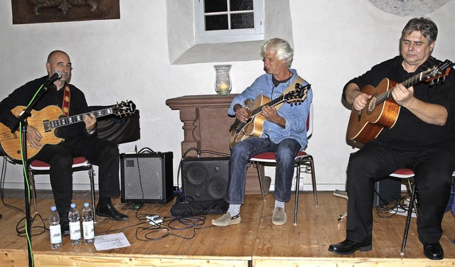 Jean-Max Coustet, Marc Wise und  Eric ...he,  was alles in der Gitarre steckt.   | Foto: Anja Bertsch