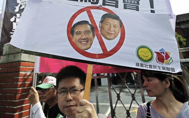 Demonstranten in Taiwan protestieren gegen das Treffen.   | Foto: dpa