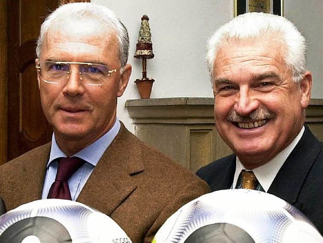 Franz Beckenbauer (links) und sein Str...eher in Sachen WM 2006, Fedor Radmann.  | Foto: dpa