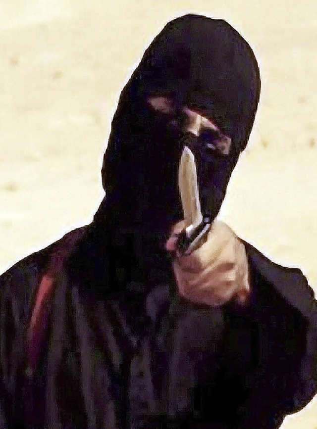 Der Screenshot eines IS-Videos zeigt &#8222;Jihadi John&#8220;.   | Foto: DPA