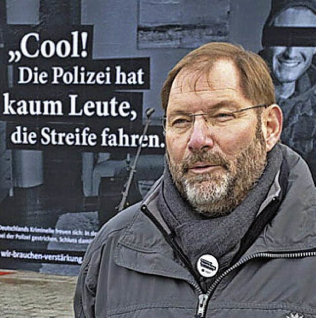 Vizechef Jrg Radek vor einem Plakat  der GdP  | Foto: Hagen Immel (GdP)