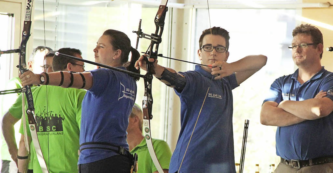 Laura Sprich, Benjamin Skorupan und Trainer Kai Kiefer (v. links)   | Foto: zvg